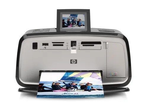 Karşılaştırma Canon SELPHY QX20 RD Fotoğraf Yazıcısı İle HP Photosmart A717 Kompakt Fotoğraf Yazıcısı, Mürekkep Püskürtmeli, 4800x1200 DPI